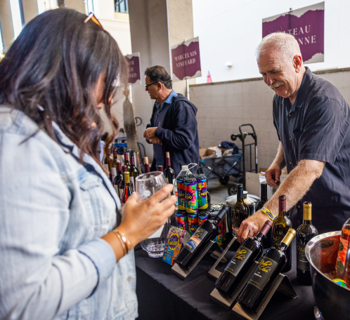 Foothill Wine Fest grand tasting — wine being poured into glasses