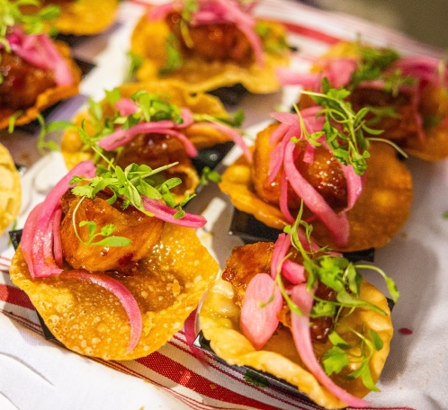 mini tostadas with pork belly, red onion and cilantro